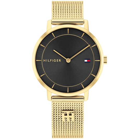TOMMY HILFIGER LADIES. GOLD PLATED CASE AND MESH BRACELET. BLACK DIAL.